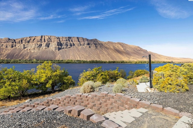 view of mountain feature featuring a water view