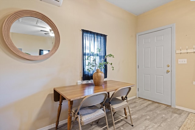 dining space featuring light wood-type flooring
