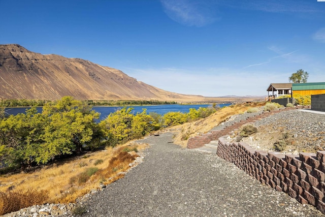 mountain view featuring a water view