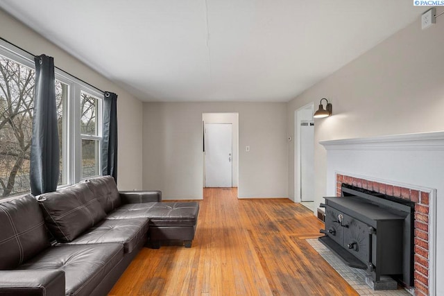 living area with hardwood / wood-style floors