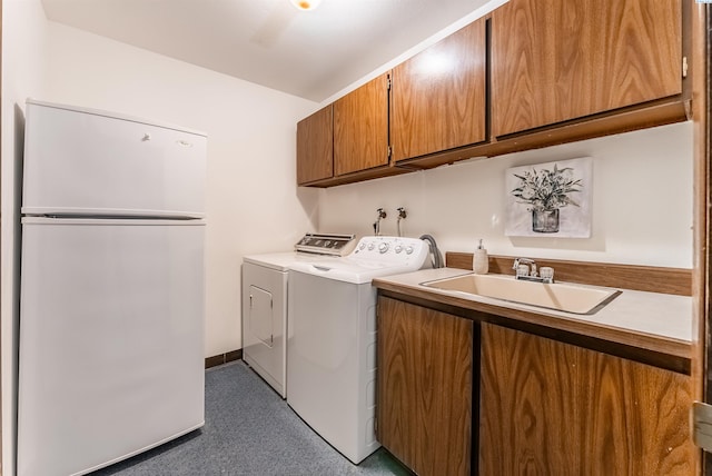 2912 W Hood Ave Unit B203, Kennewick, WA 99336 - washroom with cabinet space and washing machine and clothes dryer