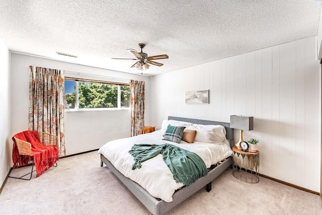 2912 W Hood Ave Unit B203, Kennewick, WA 99336 - bedroom with carpet floors, a textured ceiling, and ceiling fan
