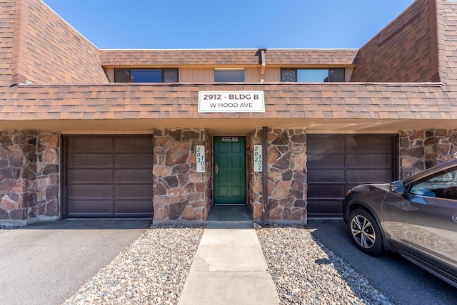 2912 W Hood Ave Unit B203, Kennewick, WA 99336 - view of property with driveway and an attached garage