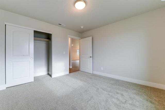 6150 W 30th Pl, Kennewick, WA 99338 - unfurnished bedroom with carpet floors, baseboards, and a closet
