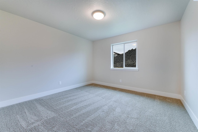 6150 W 30th Pl, Kennewick, WA 99338 - carpeted spare room with baseboards