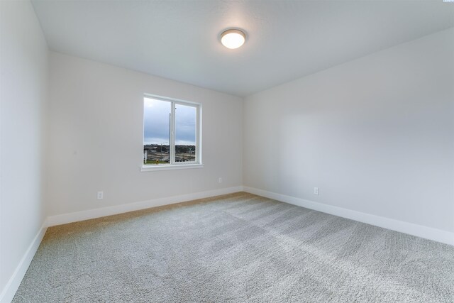 6150 W 30th Pl, Kennewick, WA 99338 - unfurnished room with light colored carpet and baseboards