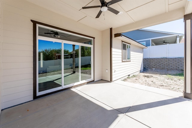 view of patio featuring ceiling fan