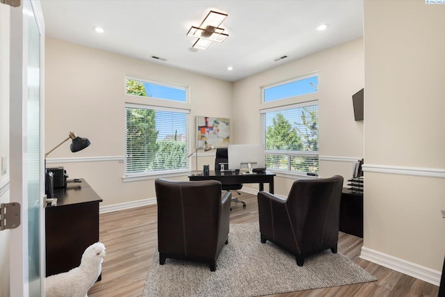 office area featuring light hardwood / wood-style floors