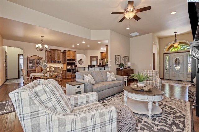 404 S Georgia St, Kennewick, WA 99338 - living area featuring recessed lighting, ceiling fan with notable chandelier, and wood finished floors