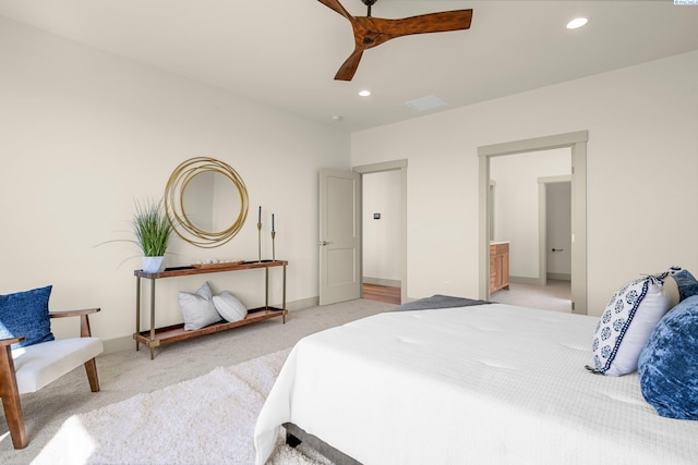 bedroom featuring recessed lighting, light colored carpet, ceiling fan, and baseboards