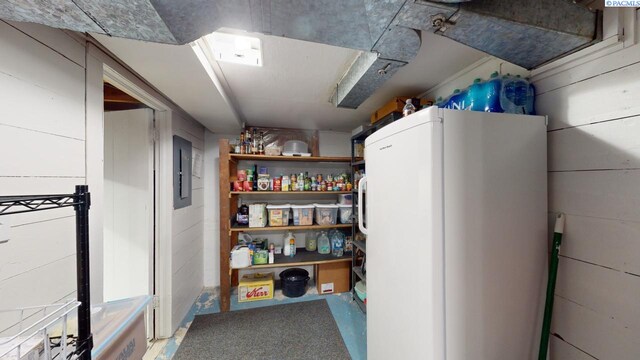 storage room with electric panel