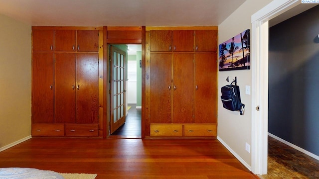 unfurnished bedroom featuring dark hardwood / wood-style floors