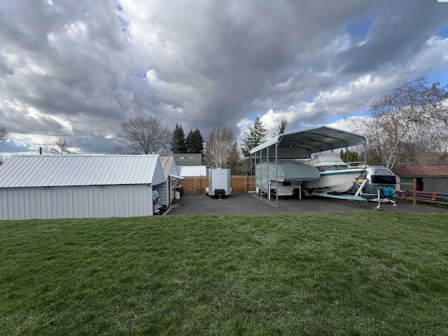 view of yard featuring a carport