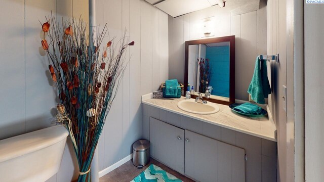 bathroom with vanity and toilet