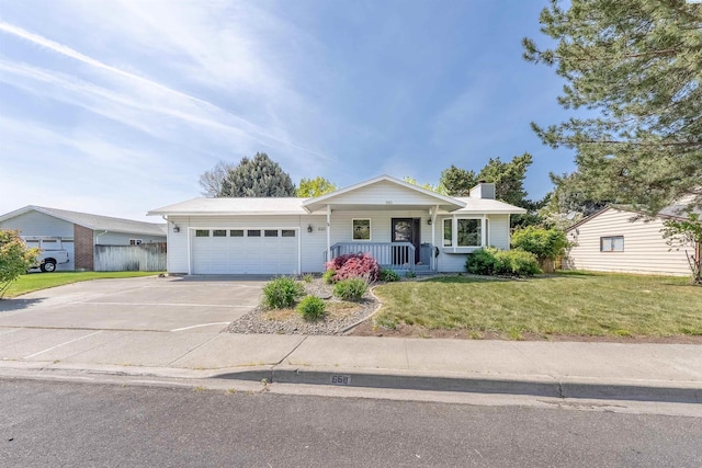 ranch-style house with a chimney, covered porch, a garage, driveway, and a front yard