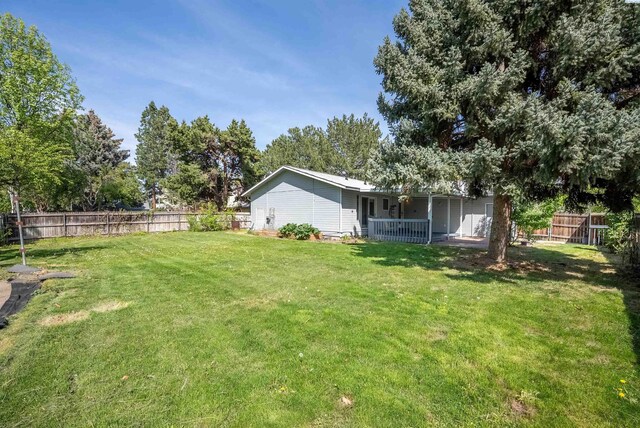 view of yard with a fenced backyard