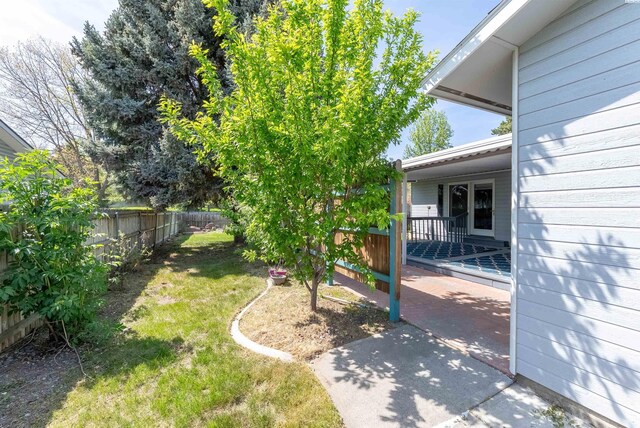 view of yard with a fenced backyard