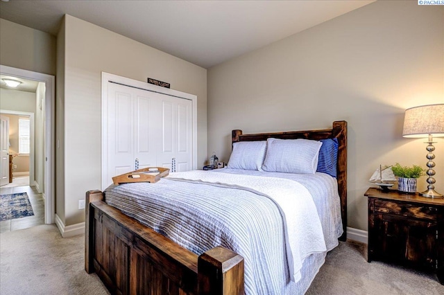 87021 Summit View Dr, Kennewick, WA 99338 - bedroom featuring light colored carpet, a closet, and baseboards