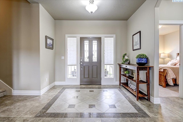 87021 Summit View Dr, Kennewick, WA 99338 - entryway featuring baseboards and inlaid floor details