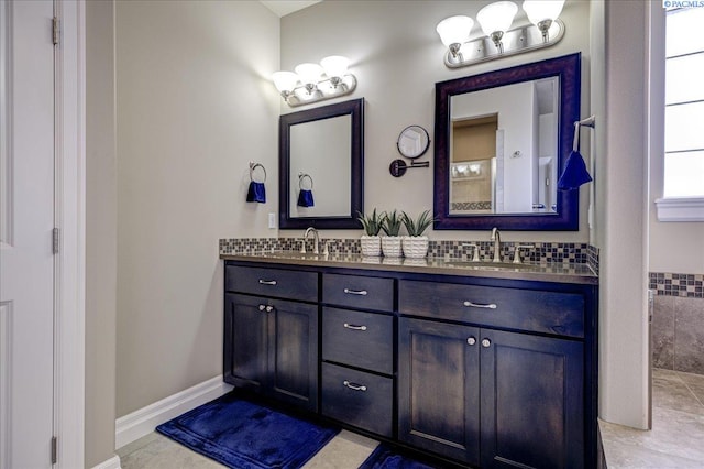 87021 Summit View Dr, Kennewick, WA 99338 - bathroom featuring double vanity and baseboards
