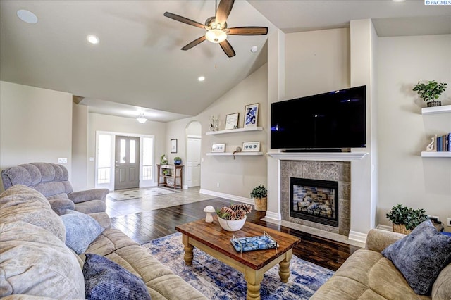 87021 Summit View Dr, Kennewick, WA 99338 - living area with a ceiling fan, hardwood / wood-style floors, arched walkways, recessed lighting, and a tiled fireplace