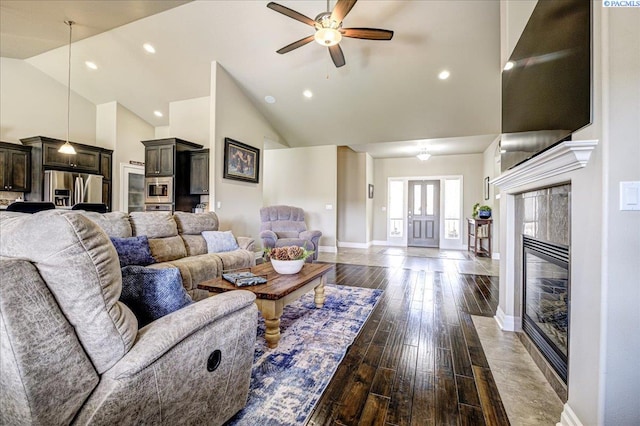 87021 Summit View Dr, Kennewick, WA 99338 - living room featuring high vaulted ceiling, a ceiling fan, baseboards, wood-type flooring, and recessed lighting