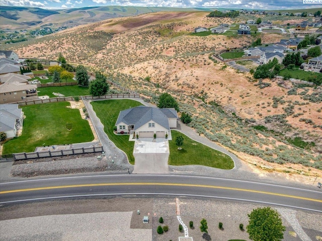 87021 Summit View Dr, Kennewick, WA 99338 - aerial overview of property's location with nearby suburban area and a mountain backdrop