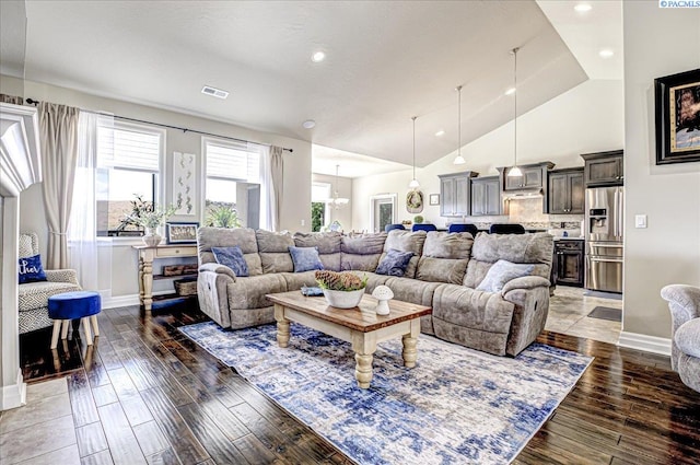 87021 Summit View Dr, Kennewick, WA 99338 - living area featuring hardwood / wood-style floors, baseboards, recessed lighting, and high vaulted ceiling