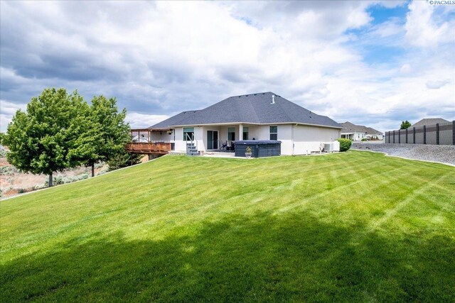 87021 Summit View Dr, Kennewick, WA 99338 - rear view of house with a hot tub, central air condition unit, and a deck