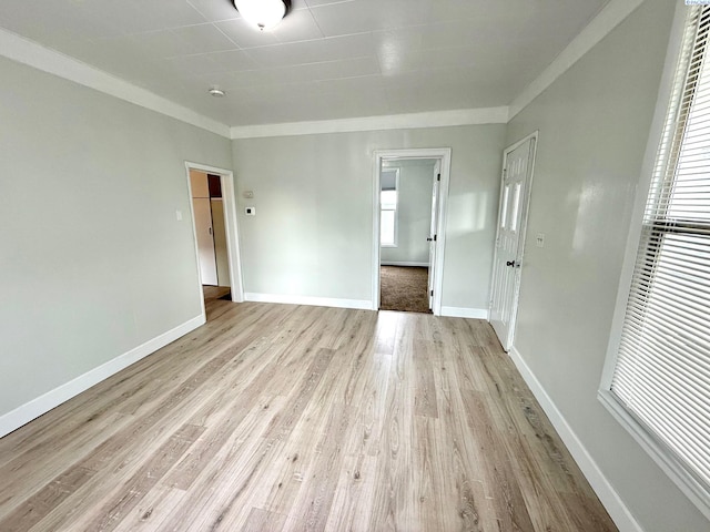 419 W A Ave, Colfax, WA 99111 - empty room with light wood-style floors, crown molding, and baseboards