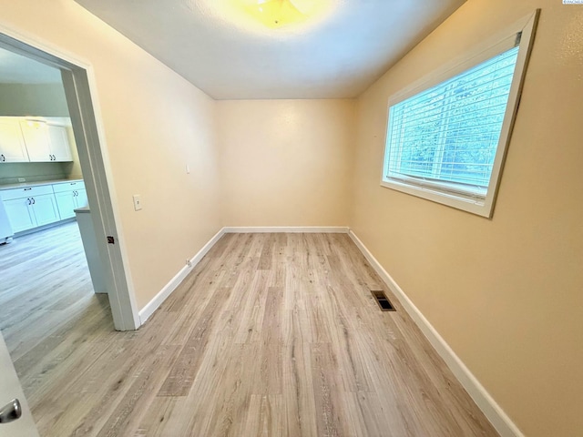419 W A Ave, Colfax, WA 99111 - empty room featuring light wood-style floors and baseboards