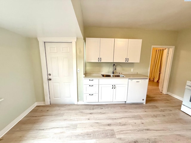 419 W A Ave, Colfax, WA 99111 - kitchen with a sink, white dishwasher, white cabinets, and light countertops