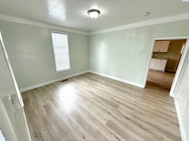 419 W A Ave, Colfax, WA 99111 - empty room with light wood-style floors, baseboards, and a smoke detector