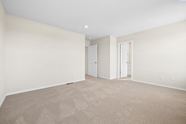 688 S Zeelar St, Kennewick, WA 99336 - unfurnished room with baseboards, light colored carpet, and recessed lighting