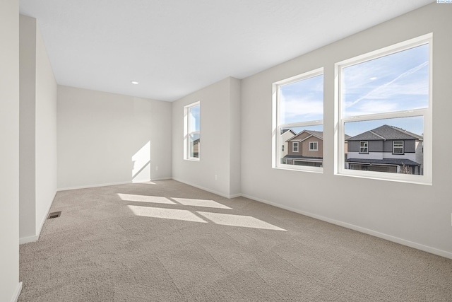 688 S Zeelar St, Kennewick, WA 99336 - empty room featuring light colored carpet, baseboards, and recessed lighting