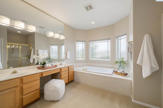 1209 W Canyon Lakes Dr, Kennewick, WA 99337 - bathroom with healthy amount of natural light, double vanity, a shower stall, and a bath