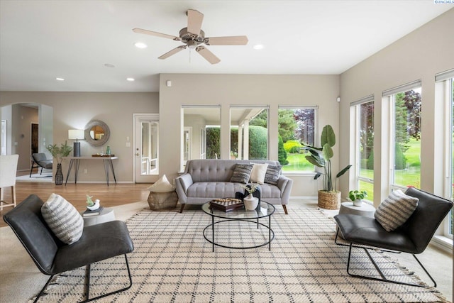 1209 W Canyon Lakes Dr, Kennewick, WA 99337 - living area with arched walkways, plenty of natural light, recessed lighting, and a ceiling fan