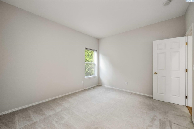 1209 W Canyon Lakes Dr, Kennewick, WA 99337 - unfurnished room featuring light colored carpet and a smoke detector
