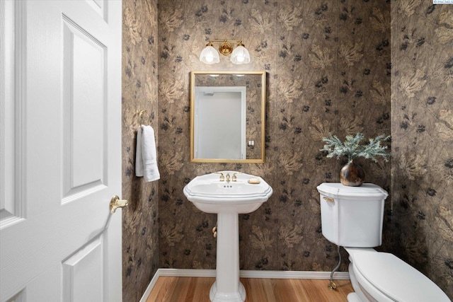 1209 W Canyon Lakes Dr, Kennewick, WA 99337 - bathroom with toilet and wood finished floors