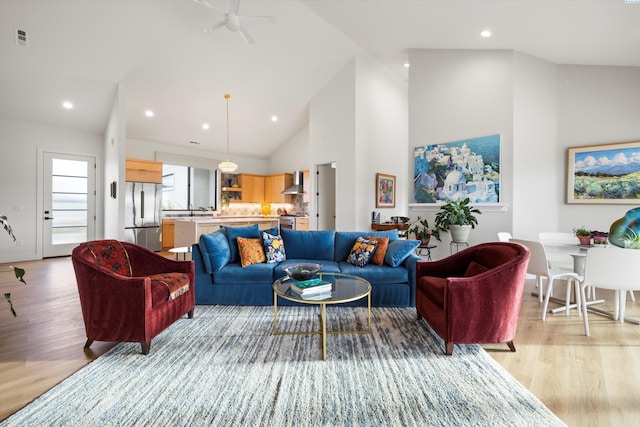 7004 Ricky Rd, Pasco, WA 93301 - living room with visible vents, high vaulted ceiling, light wood-style flooring, recessed lighting, and ceiling fan