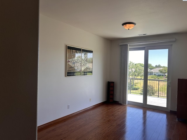 3405 S Johnson St, Kennewick, WA 99337 - spare room with dark wood-style flooring and baseboards