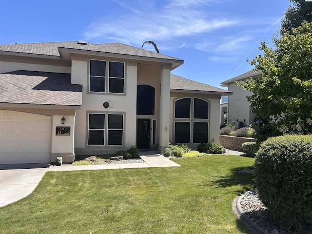 3405 S Johnson St, Kennewick, WA 99337 - view of front of home with a front lawn, stucco siding, a garage, roof with shingles, and driveway