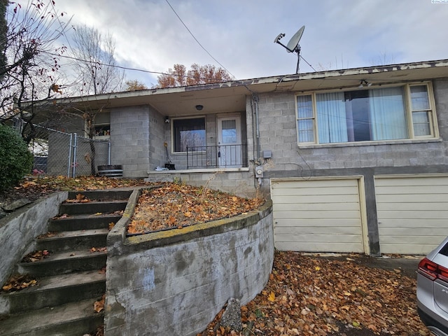 exterior space with a garage