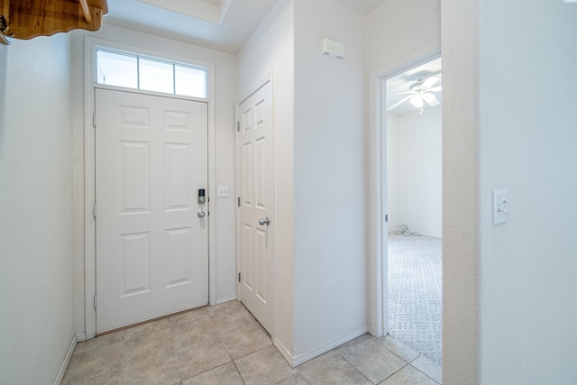 entryway featuring light tile patterned floors