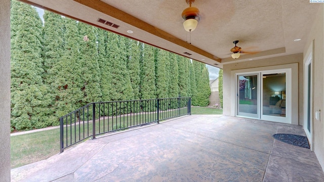 view of patio / terrace with a balcony and ceiling fan