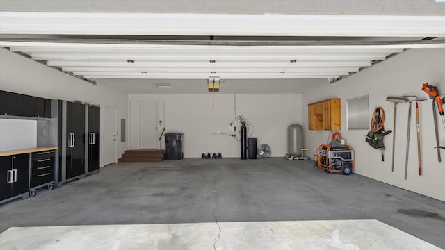 151002 W Richards Rd, Prosser, WA 99350 - garage with electric panel and a garage door opener