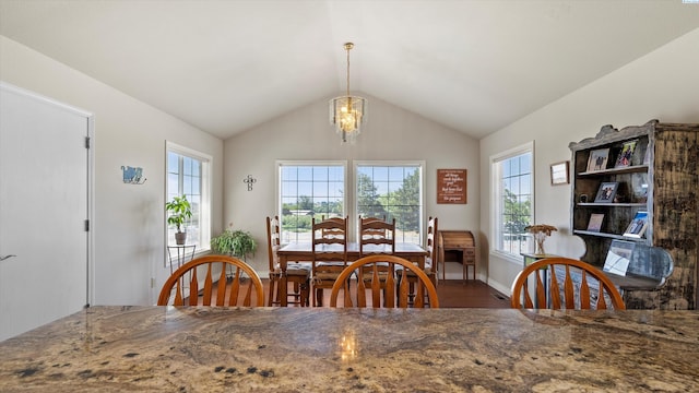 151002 W Richards Rd, Prosser, WA 99350 - dining space featuring wood finished floors, vaulted ceiling, and a chandelier
