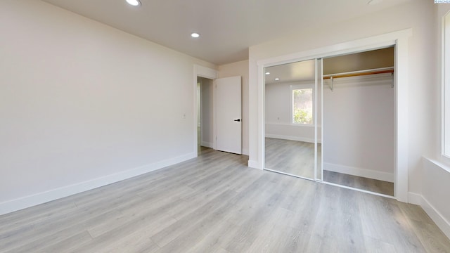 715 NW Ritchie St, Pullman, WA 99163 - unfurnished bedroom featuring light wood-type flooring, recessed lighting, and a closet