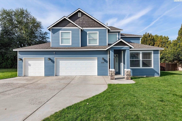 view of front facade featuring a garage and a front yard