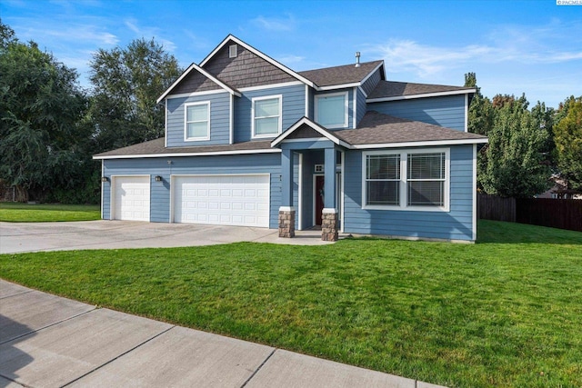 craftsman-style house with a garage and a front yard